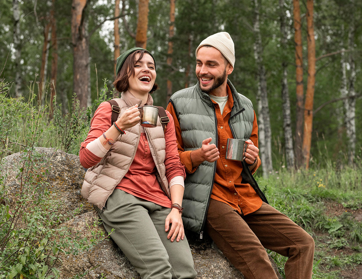 Happy couple in nature camping after the male received therapy for his Anxiety at Conventions Psychiatry and Counseling in Naperville IL